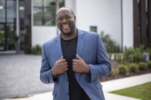 A Photo of Daryll Stinson is captured. He is a former Division 1 athlete, founder of Division 1 Athletes, motivational speaker and leadership coach. Daryll is featured on the Practice of the Practice, a therapist podcast