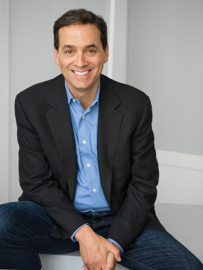 A photo of Daniel H. Pink is captured. Daniel is the author of seven books, and a journalist. He is featured on the Practice of the Practice, a therapist podcast.