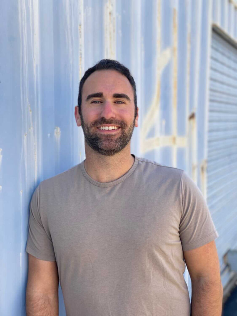 A photo of Jake Kelfer is captured. He is a lifestyle entrepeneur, motivational speaker, and author. Jake is featured on the Practice of the Practice, a therapy podcast. He speaks with Joe Sanok about writing books.