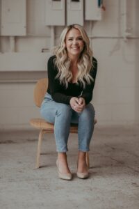 A photo of Ashley Mielke is captured. She is a Registered Psychologist, Founder and CEO of a large group private practice in Alberta, Canada called The Grief and Trauma Healing Centre Inc. She is featured on the Practice of the Practice, a therapist podcast.