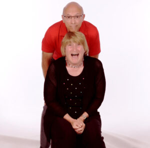 An image of Ellen Gigliotti and Dr. Peter Gigliotti is captured. They are featured on the Practice of the Practice Podcast, a therapist podcast.