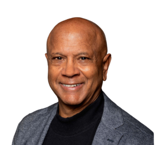 A photo of Dr. Paul Guillory is captured. He is an author, trainer, and associate professor. Dr. Guillory is featured on the Practice of the Practice, a therapist podcast.