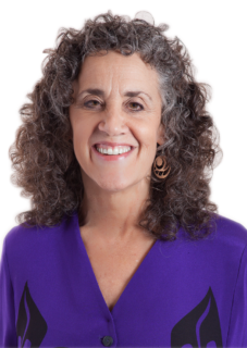 A photo of Julie Schwartz-Gottman is captured. She is the co-founder of The Gottman Institute and a clinical psychologist. Julie is featured on the Practice of the Practice, a therapist podcast. 
