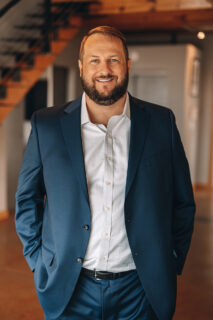 A photo of Chris Dreyer is captured. He is the founder and CEO of Rankings.io and the host of the Personal Injury Marketing Mastermind podcast. Chris is featured on the Practice of the Practice, a therapist podcast.