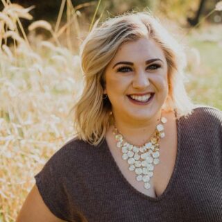 A photo of Ashton Whitmoyer-Ober is captued. She is an author, public speaker, Community Psychologist, and certified Enneagram educator. Ashton is featured on Grow a group Practice, a therapist podcast.